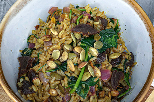 Curried-brown-rice-with-pumpkin-seeds-apricots-and-spinach